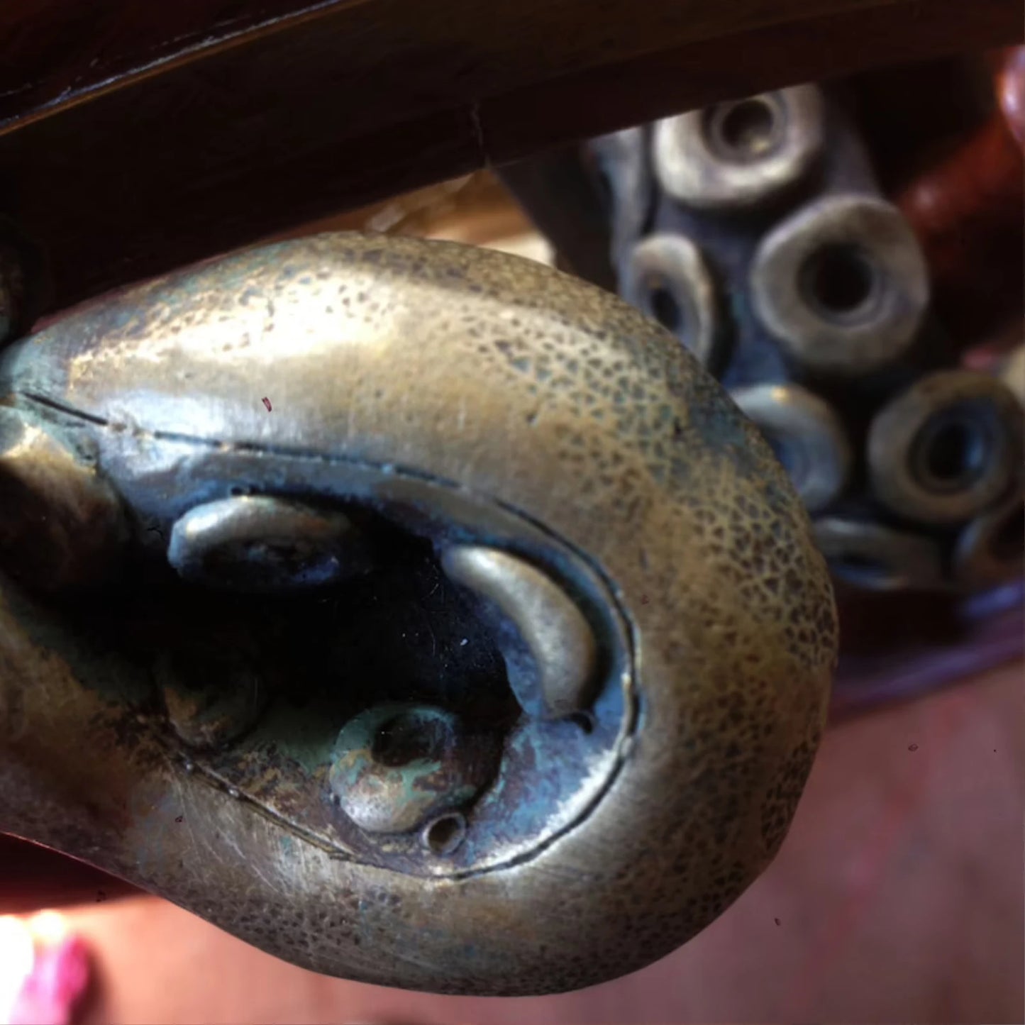 Side view of retro octopus door knob handle with curled tentacles and textured resin surface.