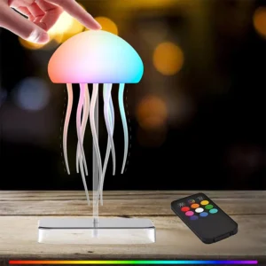 LED jellyfish lamp with 9 glowing tentacles and remote control lighting up a bedside table